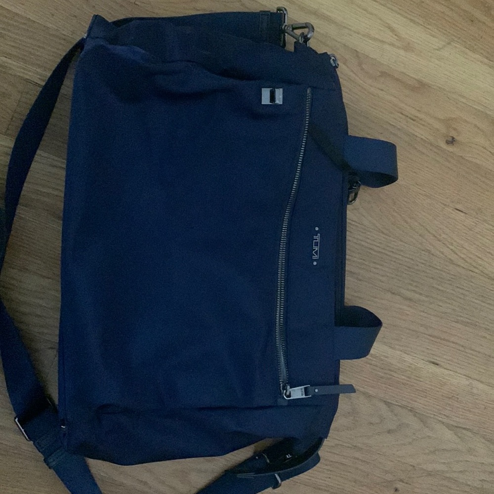 Tumi laptop bag with luggage sleeve